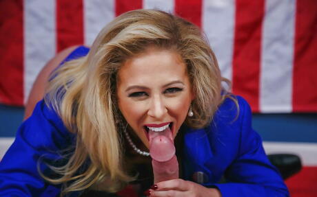 Tempting american blonde milf Cherie Deville blows on rod and takes a messy cum shot 